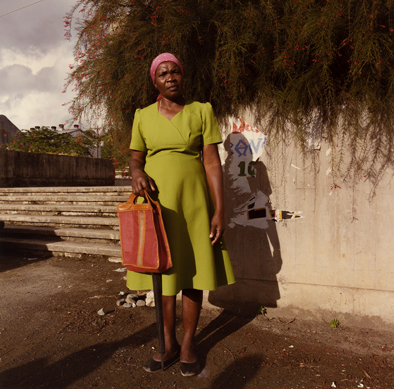 Untitled (Woman in green dress) from Tobago, West Indies by Carol Fisher