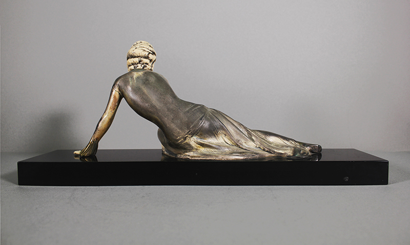 Reclining Woman in Elegant Gown by Menneville